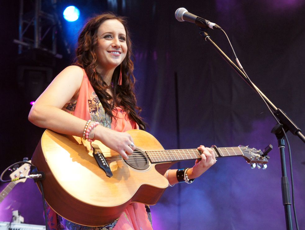 Kaylee Bell performs at Toyota Park in the grand final. Kaylee Bell performs at Toyota Park in the grand final.