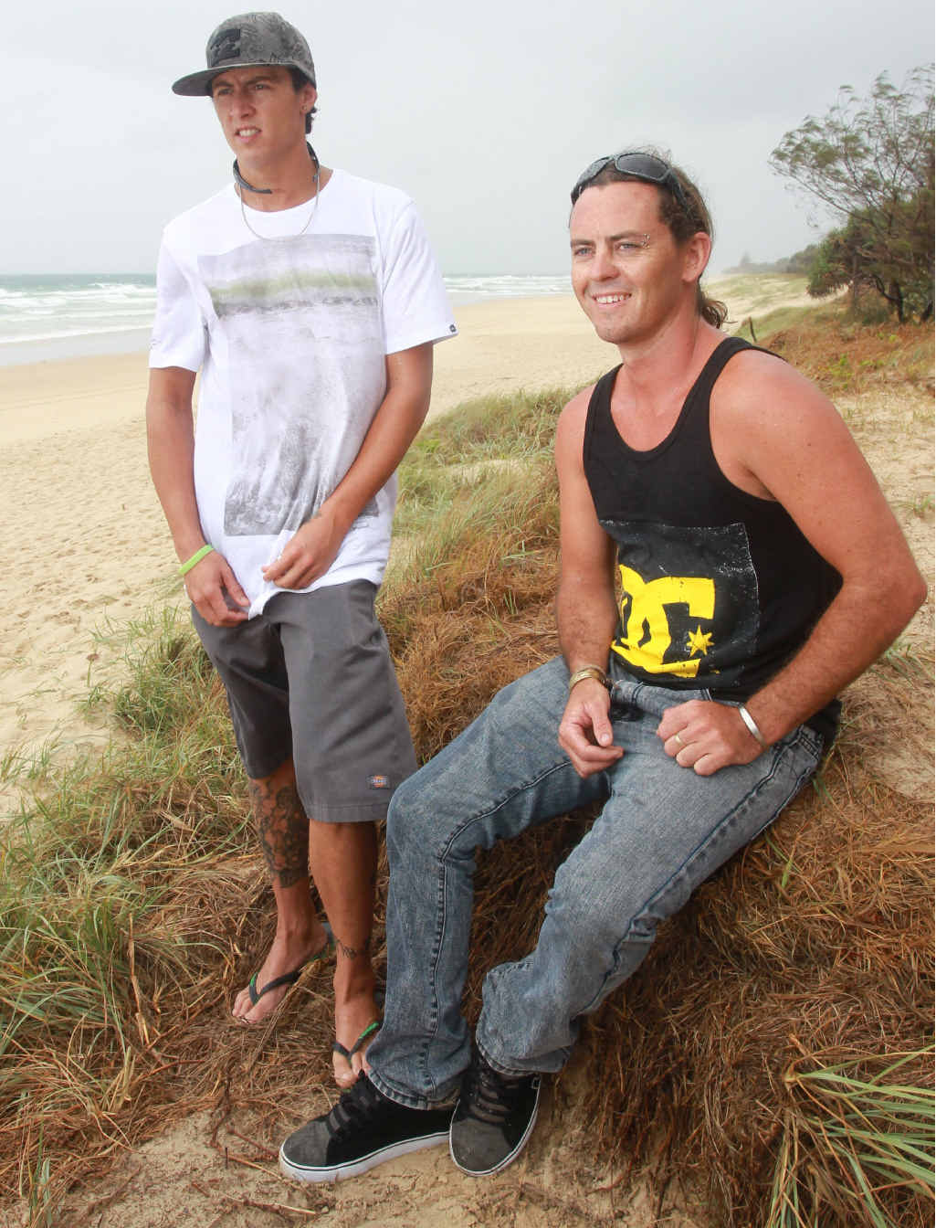 RESCUE HEROES: Mates Damon Bell (left) and Blake Cole risked their lives to help tourists who were caught in a rip at Marcoola Beach. RESCUE HEROES: Mates Damon Bell (left) and Blake Cole risked their lives to help tourists who were caught in a rip at Marcoola Beach.