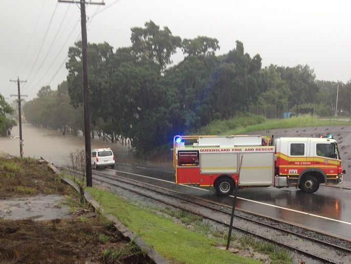 A car can be seen in the distance (middle left of photograph), submerged in floodwaters on Kent St in Maryborough. A car can be seen in the distance (middle left of photograph), submerged in floodwaters on Kent St in Maryborough.