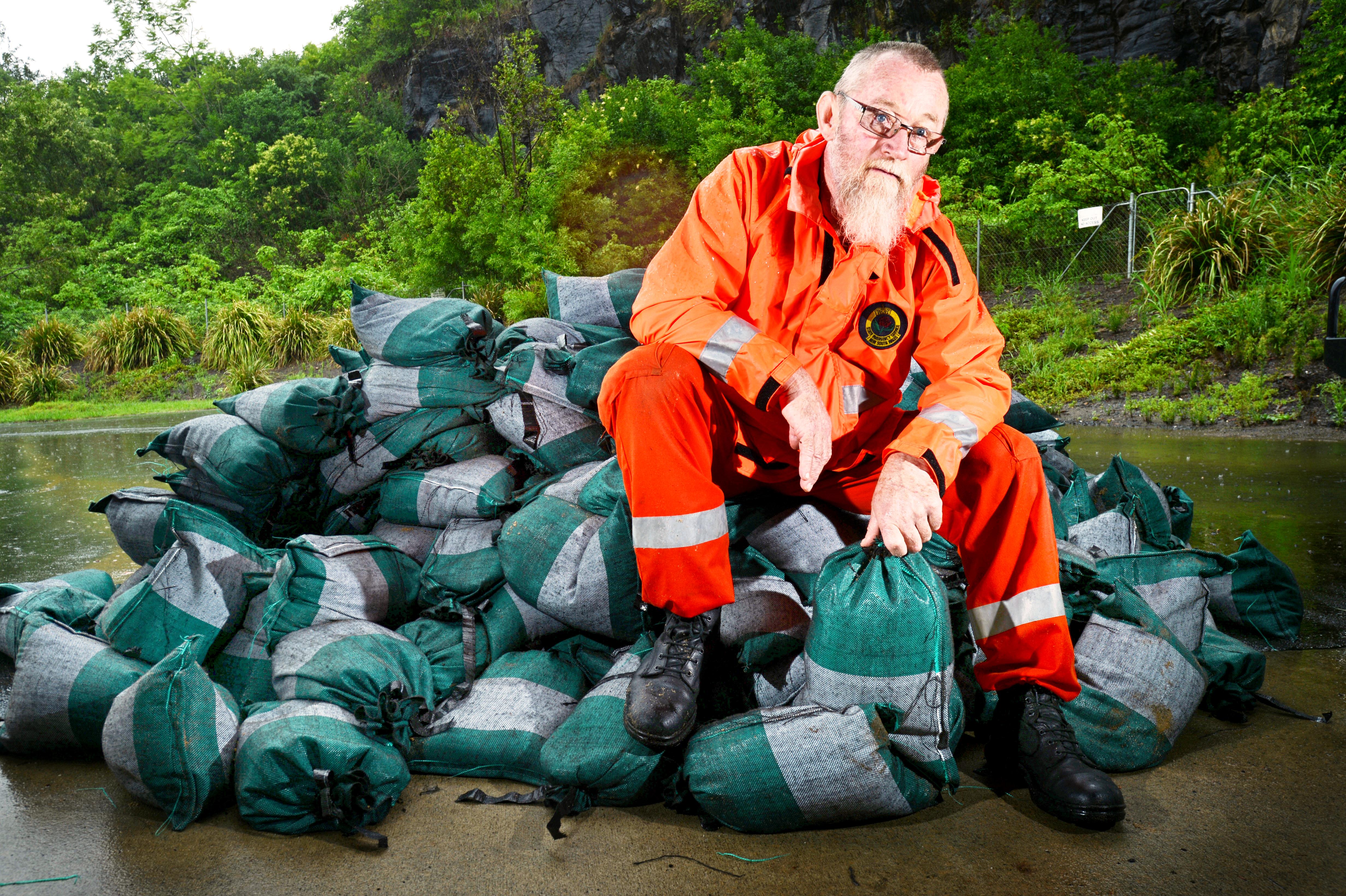 Graeme Hall of The Lismore SES sitting on a pile of sandbags at the Lismore SES depot. Photo Patrick Gorbunovs / The Northern Star Graeme Hall of The Lismore SES sitting on a pile of sandbags at the Lismore SES depot. Photo Patrick Gorbunovs / The Northern Star