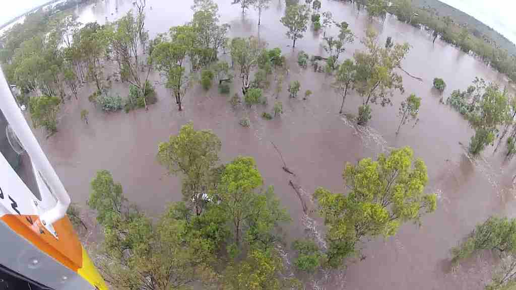 Two women and a 14-month-old child have been saved from floodwater by the Rescue 300 crew. Two women and a 14-month-old child have been saved from floodwater by the Rescue 300 crew.