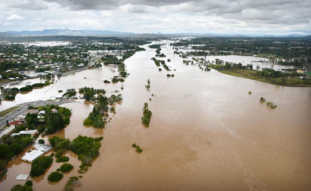 The Mary River at its peak of 19.95m. Kidd Bridge is under water in the foreground looking south east. The Mary River at its peak of 19.95m. Kidd Bridge is under water in the foreground looking south east.