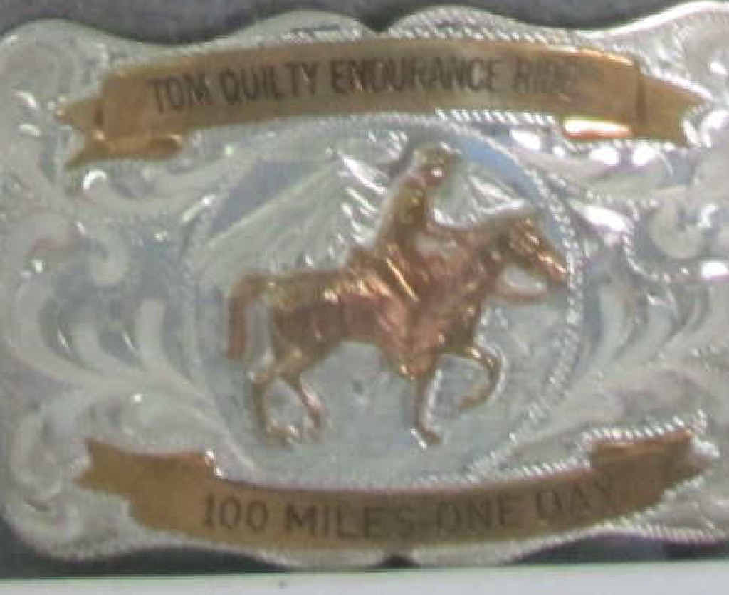 Dick won the right to wear the coveted belt buckle after his first Tom Quilty ride in 1994. Dick won the right to wear the coveted belt buckle after his first Tom Quilty ride in 1994.