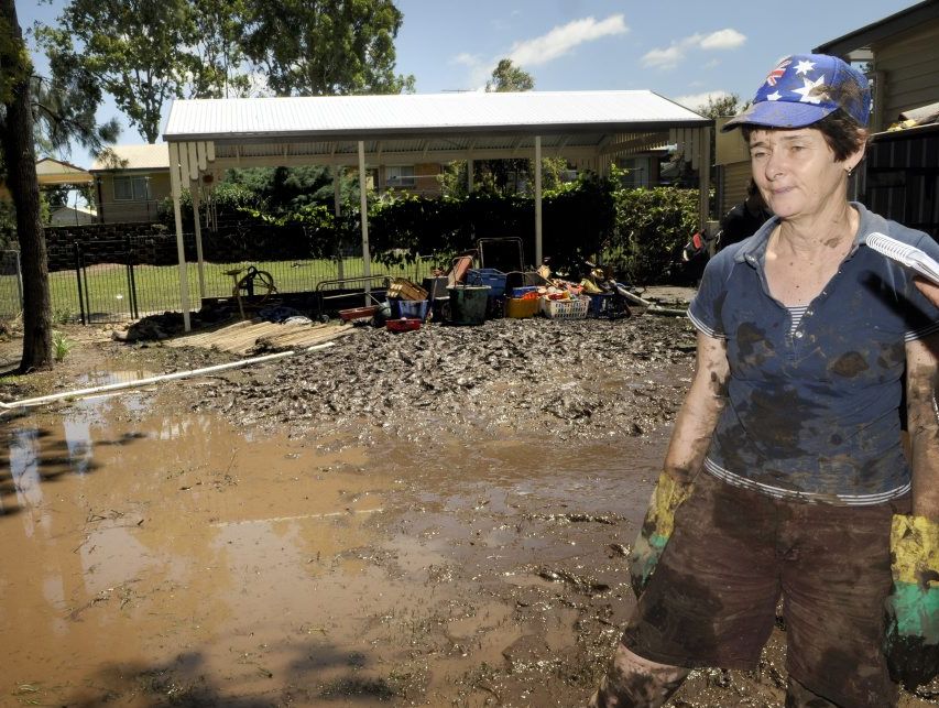 Barbara Buchanan cleans up after floodwaters inundated the Laidley kindergarten last week. Barbara Buchanan cleans up after floodwaters inundated the Laidley kindergarten last week.