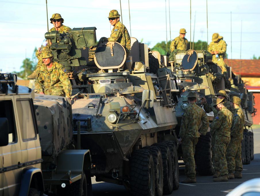 MILITARY CONVOY: The army convoy of trucks arrived at Salter Oval to assist with the flood relief recovery effort. Photo: Mike Knott / NewsMail MILITARY CONVOY: The army convoy of trucks arrived at Salter Oval to assist with the flood relief recovery effort. Photo: Mike Knott / NewsMail