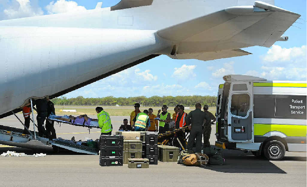 Patients from Bundaberg Hospital are loaded into the Hercules aircraft to be airlifted to Brisbane. Patients from Bundaberg Hospital are loaded into the Hercules aircraft to be airlifted to Brisbane.