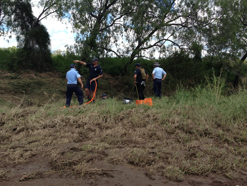 Police divers search an area near Sandy Creek in the Lockyer Valley. Police divers search an area near Sandy Creek in the Lockyer Valley.