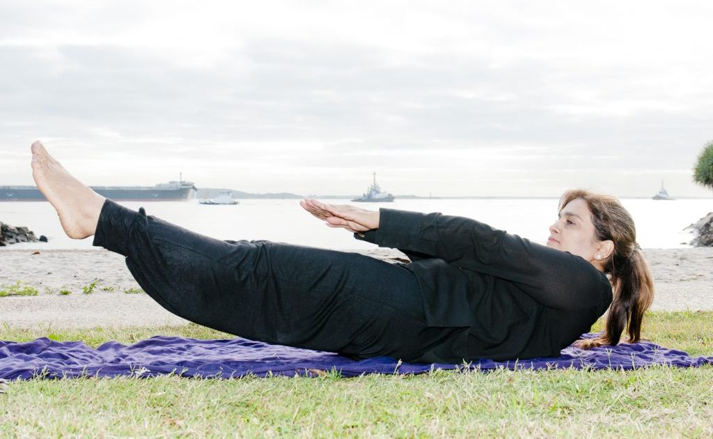 YOGA GURU: The Observer's yoga and wellbeing columnist Pushpa Bakshi at Spinnaker Park, Gladstone. YOGA GURU: The Observer's yoga and wellbeing columnist Pushpa Bakshi at Spinnaker Park, Gladstone.