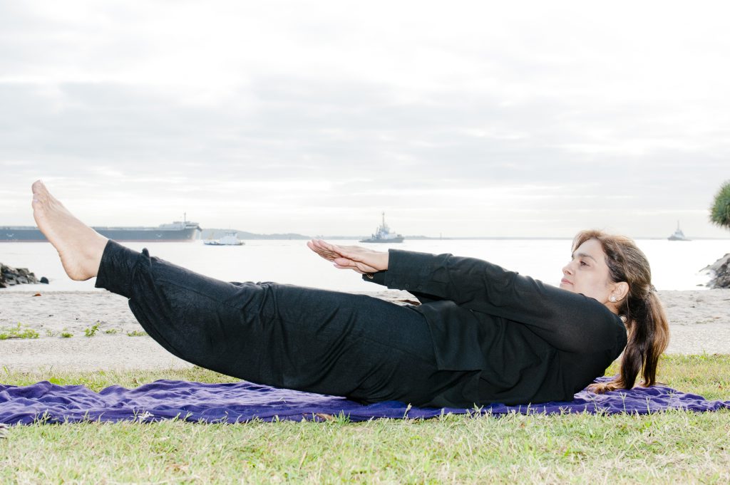 YOGA GURU: The Observer's yoga and wellbeing columnist Pushpa Bakshi at Spinnaker Park, Gladstone. YOGA GURU: The Observer's yoga and wellbeing columnist Pushpa Bakshi at Spinnaker Park, Gladstone.