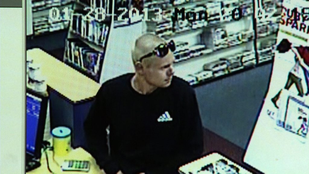 An image taken from CCTV footage of the armed robbery of a Banora Point video store on January 28, 2013. Photo Contributed An image taken from CCTV footage of the armed robbery of a Banora Point video store on January 28, 2013. Photo Contributed