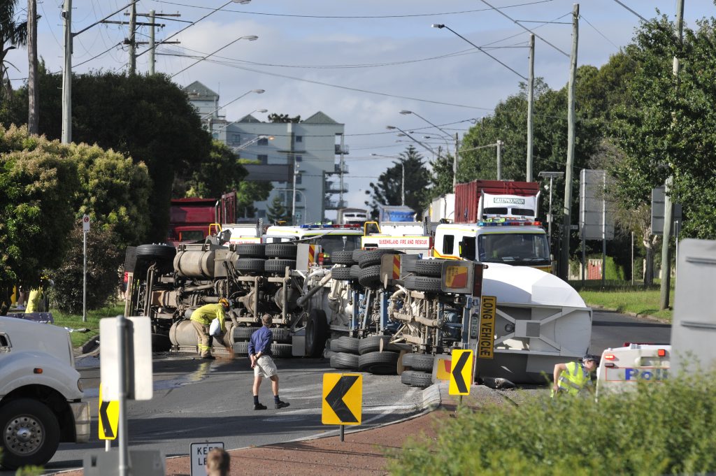 Emergency services at a truck rollover on the James St section of Warrego Hwy at the top of the range, Monday, February 04, 2013. Photo Kevin Farmer / The Chronicle Emergency services at a truck rollover on the James St section of Warrego Hwy at the top of the range, Monday, February 04, 2013. Photo Kevin Farmer / The Chronicle
