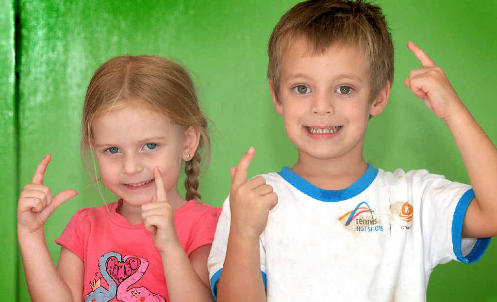 EXCITED: Indie Goodworth, 3, and Roman Nikolic, 4, practise their dance moves ahead of The Wiggles’ Mackay concerts in April.