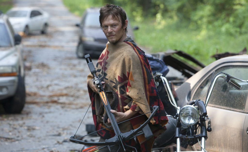 Norman Reedus in a scene from the TV series The Walking Dead. Norman Reedus in a scene from the TV series The Walking Dead.