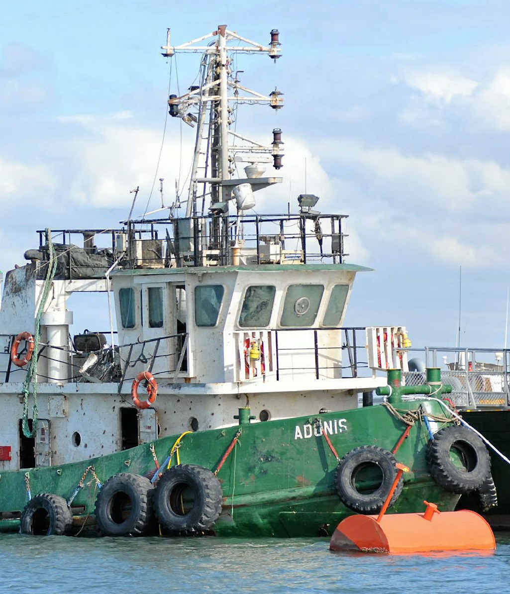 Salvage of the tug boat Adonis, which sank in Gladstone Harbour in 2011. Salvage of the tug boat Adonis, which sank in Gladstone Harbour in 2011.