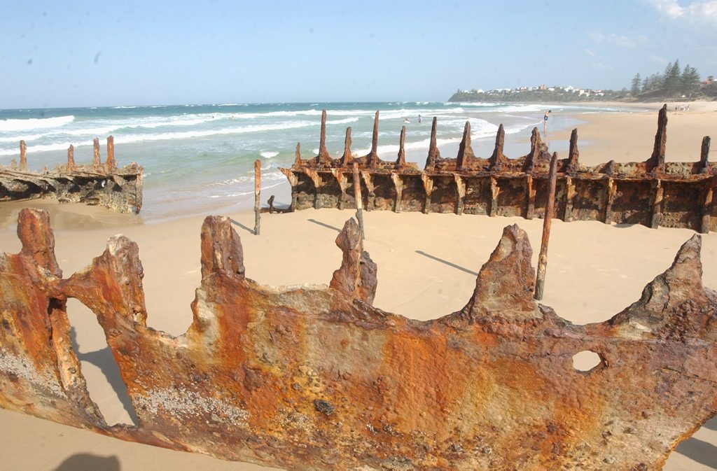 Exposed wreck of cargo ship SS Dicky which grounded at Dicky Beach in 1893. Exposed wreck of cargo ship SS Dicky which grounded at Dicky Beach in 1893.