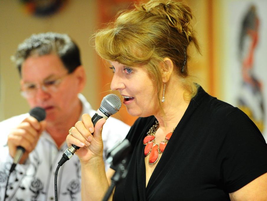 Performers John McKeuogh and Elizabeth Lanzon sing for residents at New Auckland Place.