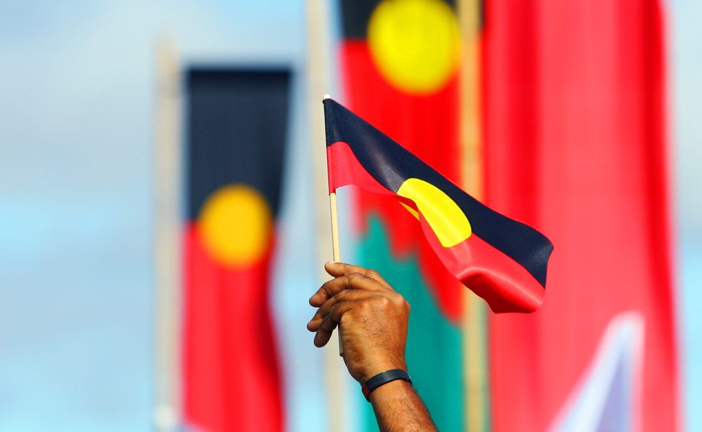 ROK-march09c Aboriginal flags fly during the Naidoc Week march through Rockhampton CHRIS ISON CI09-0710-5 ROK-march09c Aboriginal flags fly during the Naidoc Week march through Rockhampton CHRIS ISON CI09-0710-5