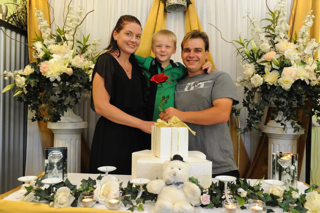 HERE COMES THE BRIDE: Bride Casey Franks and her son Tyler Leather with groom Steven Fletcher are excited about their wedding today thanks to their community who pitched in to get their wedding happening after the venue and reception location was flooded. Photo: Mike Knott / NewsMail HERE COMES THE BRIDE: Bride Casey Franks and her son Tyler Leather with groom Steven Fletcher are excited about their wedding today thanks to their community who pitched in to get their wedding happening after the venue and reception location was flooded. Photo: Mike Knott / NewsMail