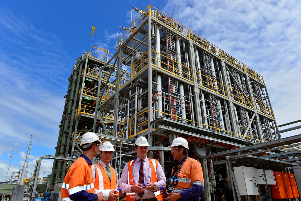 Queensland Energy Resources operations manager Chris Anderson, Environment Minister Andrew Powell, Resources and Mines Minister Andrew Cripps and QER operations superintendent Ray Pascoe at QER's demonstration plant. Queensland Energy Resources operations manager Chris Anderson, Environment Minister Andrew Powell, Resources and Mines Minister Andrew Cripps and QER operations superintendent Ray Pascoe at QER's demonstration plant.