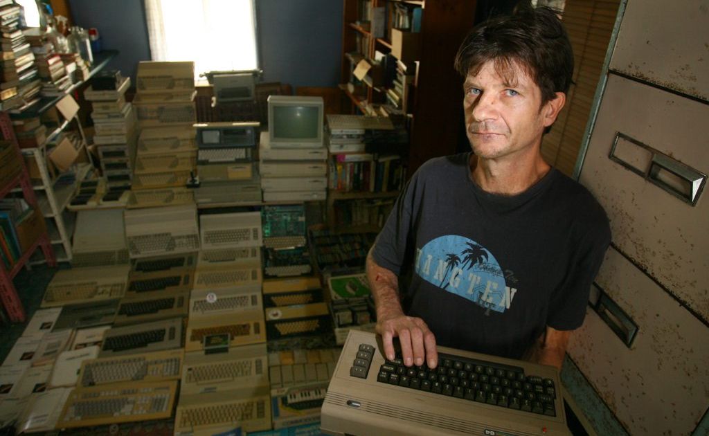 Michael Eckardt holds an old Commodore 64 dating back to the early 1980s with his collection of old computers in the background.Photo: Chris Ison / The Morning Bulletin Michael Eckardt holds an old Commodore 64 dating back to the early 1980s with his collection of old computers in the background.Photo: Chris Ison / The Morning Bulletin