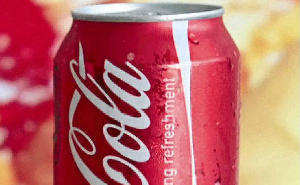 Coca-Cola has blamed UK sugar tax for a price hike. Coca-Cola has blamed UK sugar tax for a price hike.