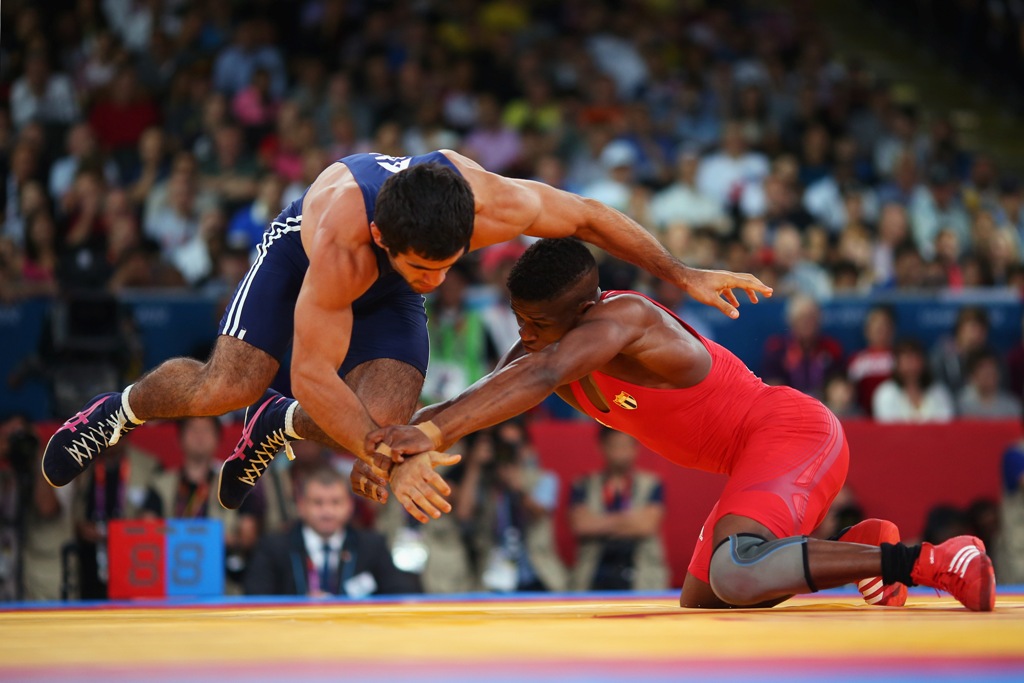 Livan Lopez Azcuy of Cuba in action against Jabrayil Hasanov of Azerbaijan during the Men's Freestyle 66 kg Wrestling bronze medal fight on Day 16 of the London 2012 Olympic Games. Livan Lopez Azcuy of Cuba in action against Jabrayil Hasanov of Azerbaijan during the Men's Freestyle 66 kg Wrestling bronze medal fight on Day 16 of the London 2012 Olympic Games.