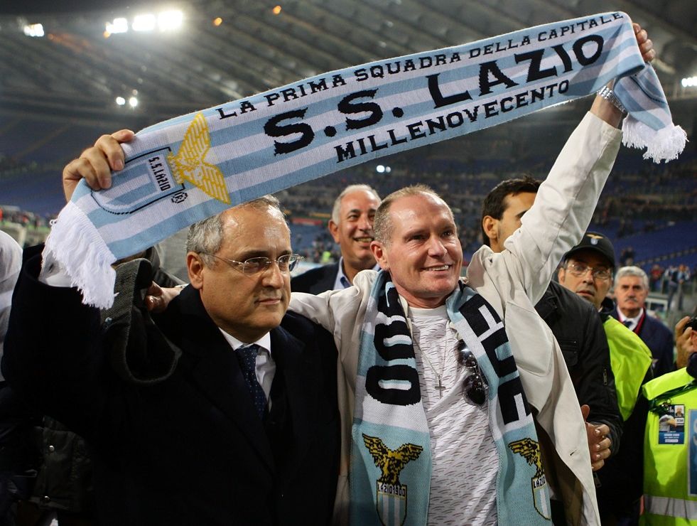 (L-R) S.S. Lazio president Claudio Lotito and former player Paul Gascoigne greet S.S. Lazio fans during the UEFA Europa League Group J match between S.S. Lazio and Tottenham Hotspur FC at Stadio Olimpico on November 22, 2012 in Rome, Italy. (L-R) S.S. Lazio president Claudio Lotito and former player Paul Gascoigne greet S.S. Lazio fans during the UEFA Europa League Group J match between S.S. Lazio and Tottenham Hotspur FC at Stadio Olimpico on November 22, 2012 in Rome, Italy.