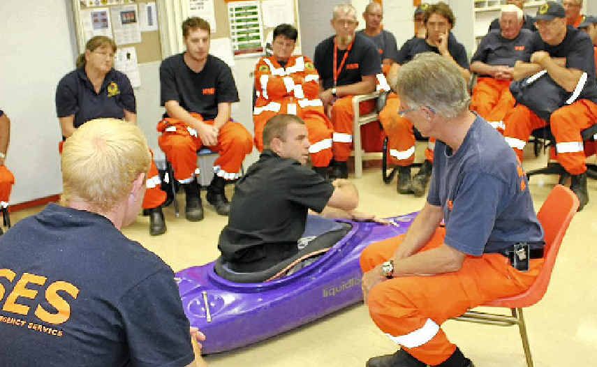 KAYAK RESCUE: Trainer Phil Benfield passes on some tips on handling a kayak to rescue volunteers from police, SES, ambulance, helicopter and road accident crews. KAYAK RESCUE: Trainer Phil Benfield passes on some tips on handling a kayak to rescue volunteers from police, SES, ambulance, helicopter and road accident crews.