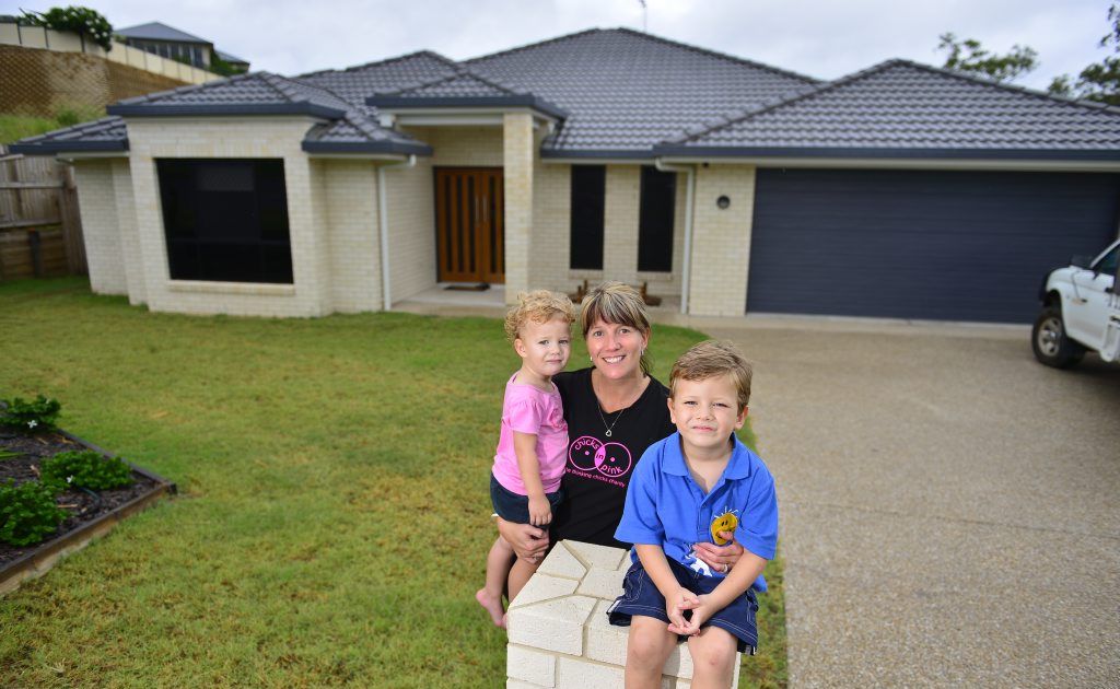Michelle Troon, with her children Jayden, 4, and Mikayla, 20 months, is happy with her house purchase in Telina. Michelle Troon, with her children Jayden, 4, and Mikayla, 20 months, is happy with her house purchase in Telina.