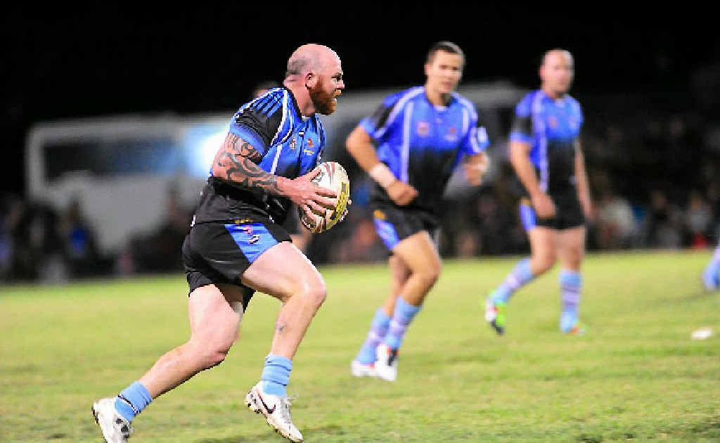 Rockhampton’s Todd Titmus steels himself to take on the Calliope defence. Rockhampton’s Todd Titmus steels himself to take on the Calliope defence.