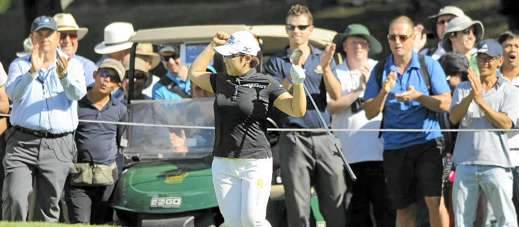 Jiyai Shin of South Korea celebrates after chipping in on the 14th hole during her final round of the Women's Australian Open at the Royal Canberra Golf Club. Jiyai Shin of South Korea celebrates after chipping in on the 14th hole during her final round of the Women's Australian Open at the Royal Canberra Golf Club.