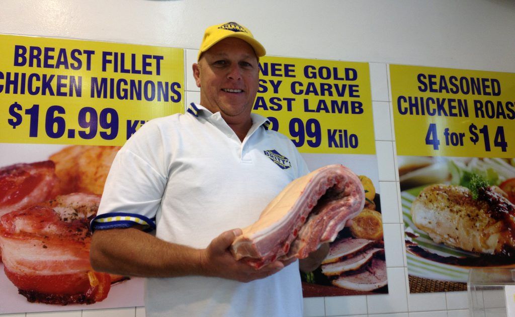 Britt's Meats manager Andrew Britt with a cut of pork belly perfect for braising. Britt's Meats manager Andrew Britt with a cut of pork belly perfect for braising.