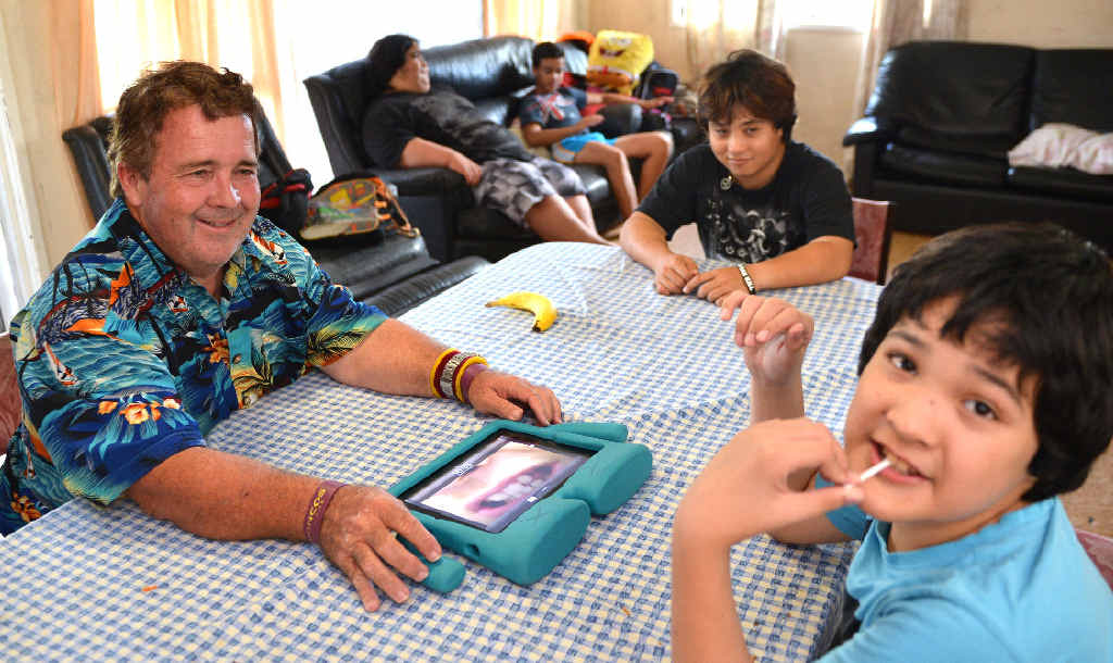 PROUD DAD: Dennis Lyons is proud of his four boys Nicholas, Alexander, Christopher and Jamie, after raising them as a single dad with the help of The Smith Family.