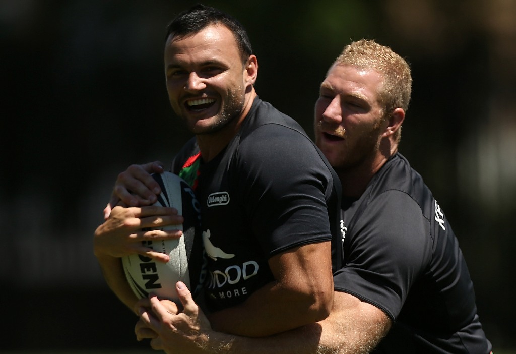 Beau Champion is tackled by Michael Crocker during a South Sydney Rabbitohs NRL training session at the National Centre for Indigenous Excellence on February 19, 2013 in Sydney, Australia. Beau Champion is tackled by Michael Crocker during a South Sydney Rabbitohs NRL training session at the National Centre for Indigenous Excellence on February 19, 2013 in Sydney, Australia.