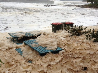 Yamba covered in sea foam after storm. Yamba covered in sea foam after storm.