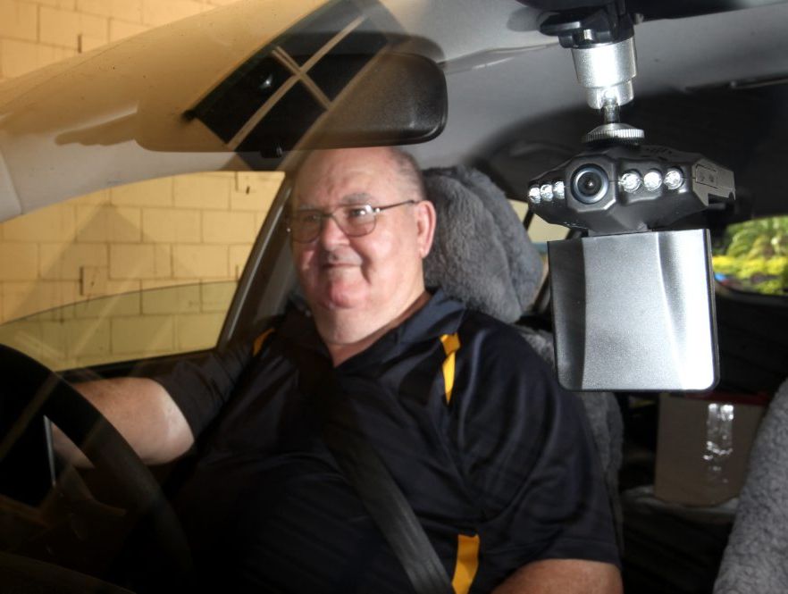 John Wallis installed cameras in his car and has posted videos on Youtube of bad drivers. Photo Allan Reinikka / The Morning Bulletin John Wallis installed cameras in his car and has posted videos on Youtube of bad drivers. Photo Allan Reinikka / The Morning Bulletin