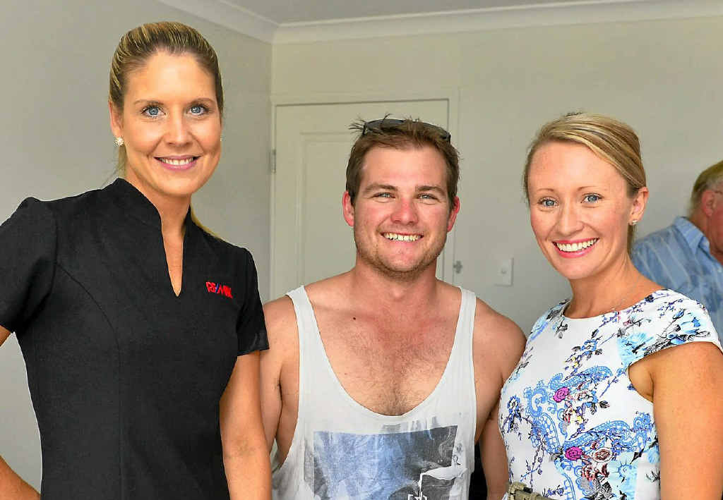 Kate Vicente, and Chris and Alicia Williams check out the Peet Charity House in Gladstone on Saturday. Kate Vicente, and Chris and Alicia Williams check out the Peet Charity House in Gladstone on Saturday.
