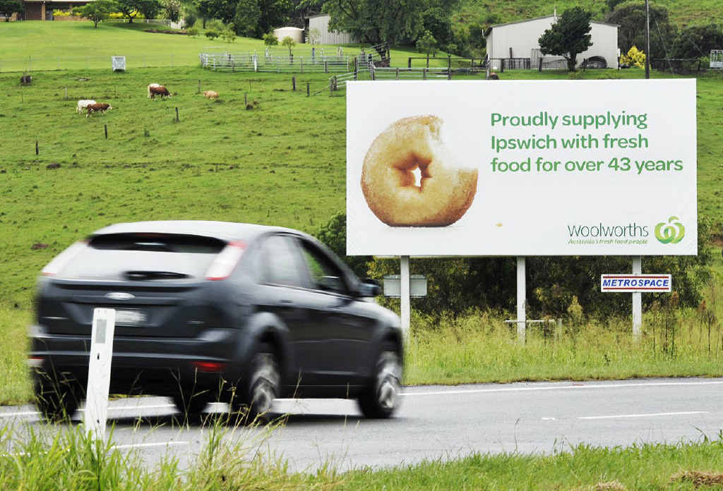 Woolworths’ doughnut billboard on the Warrego Hwy at Minden has raised hackles with the health-conscious. Woolworths’ doughnut billboard on the Warrego Hwy at Minden has raised hackles with the health-conscious.