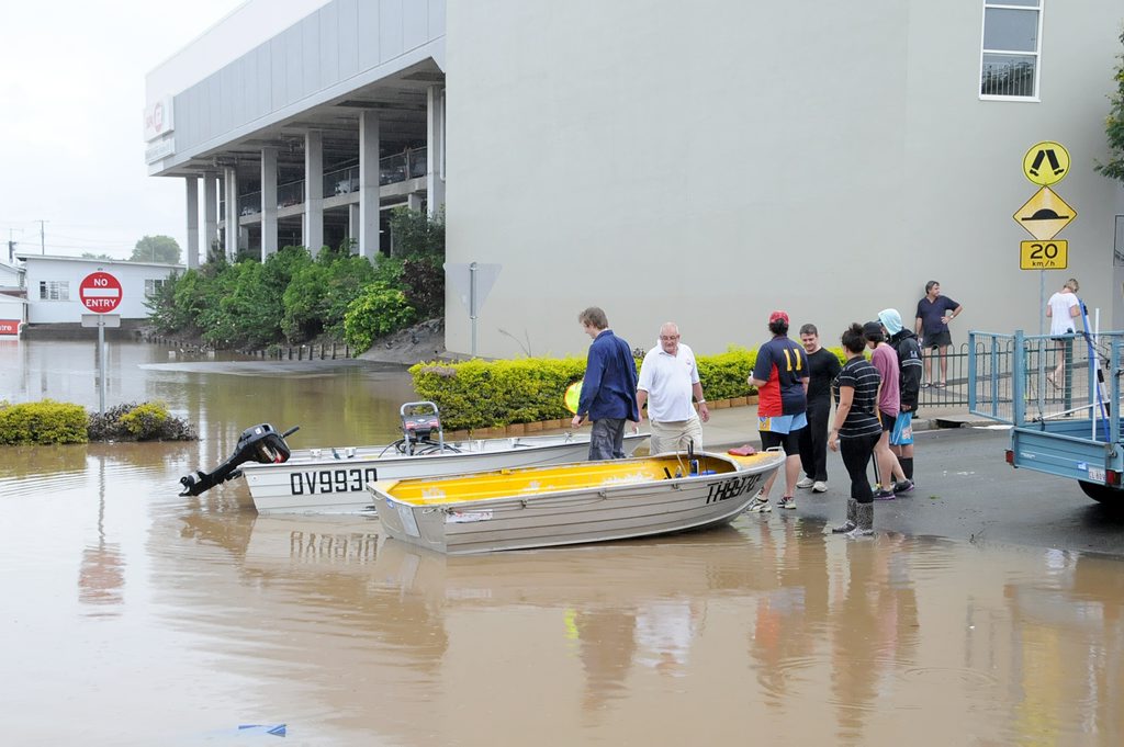 Boats are launched in preparation to clean the outside of shops as floodwaters recede in the Gympie CBD. River Road. Photo Tanya Easterby / The Gympie Times Boats are launched in preparation to clean the outside of shops as floodwaters recede in the Gympie CBD. River Road. Photo Tanya Easterby / The Gympie Times