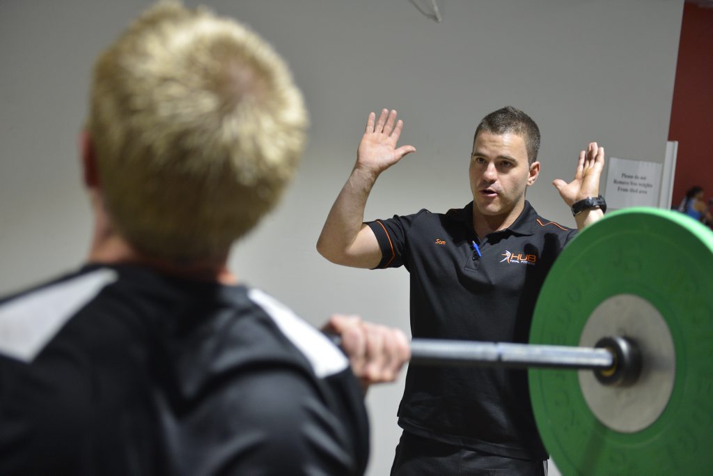 HUB Total Fitness personal trainer manager Sam Fowler and Brendan Fischer work out. HUB Total Fitness personal trainer manager Sam Fowler and Brendan Fischer work out.