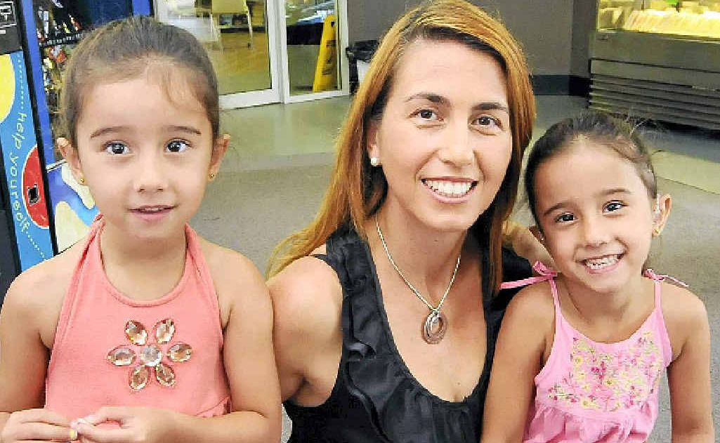 GRATEFUL RECIPIENT: Sarah Carroll (left), her twin Katrina (right) and mum Nena Carroll. GRATEFUL RECIPIENT: Sarah Carroll (left), her twin Katrina (right) and mum Nena Carroll.