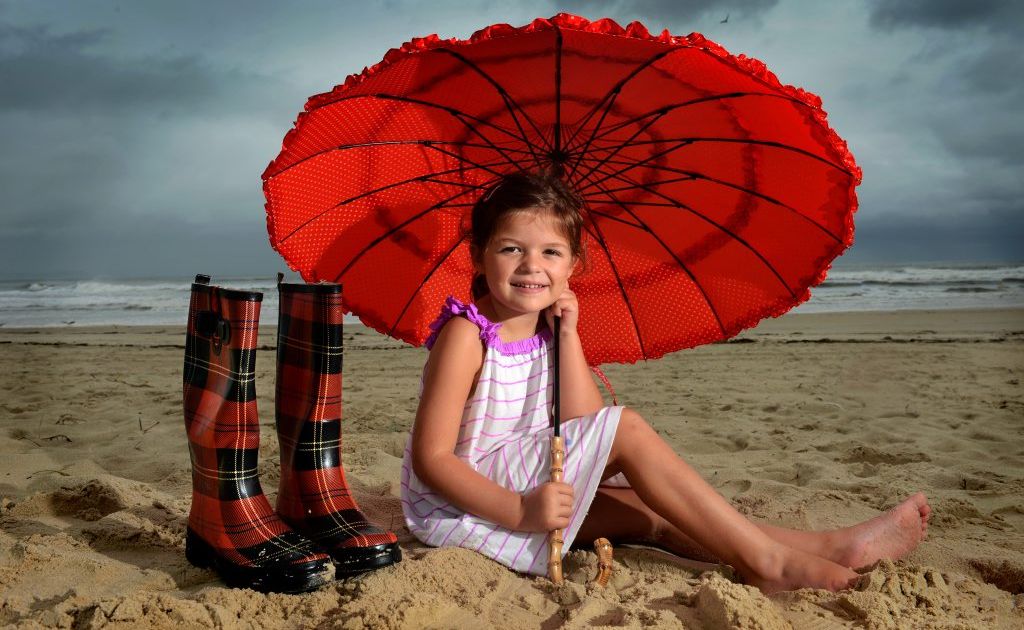 Ashleigh Cerda, 5, holidaying at Greenmount Beach in the not so welcoming weather. Ashleigh Cerda, 5, holidaying at Greenmount Beach in the not so welcoming weather.