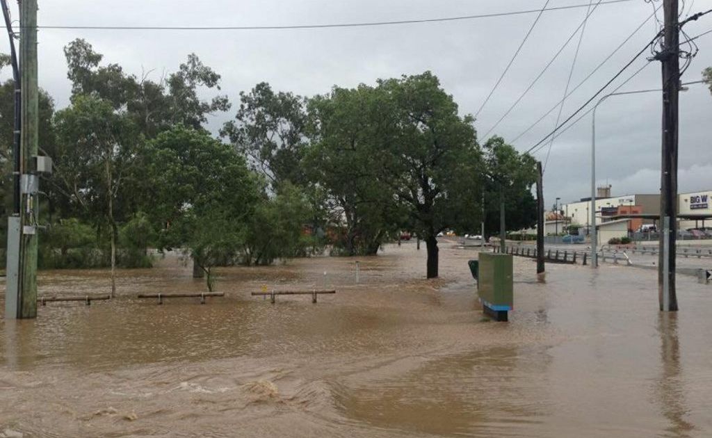 Dalby's Patrick St bridge and surrounding parkland go underwater as Myall Creek floods today. Dalby's Patrick St bridge and surrounding parkland go underwater as Myall Creek floods today.