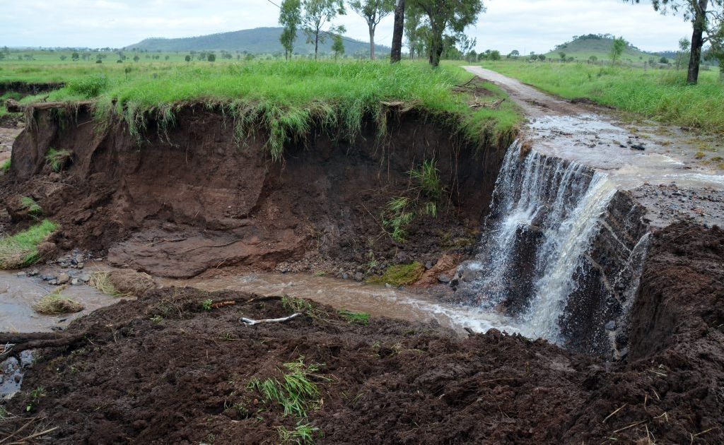 SINK HOLE: Flood waters and torrential rain have caused massive erosion on Scanlans Road, north of Gayndah. Photo Brandon Livesay / Central & North Burnett Times SINK HOLE: Flood waters and torrential rain have caused massive erosion on Scanlans Road, north of Gayndah. Photo Brandon Livesay / Central & North Burnett Times