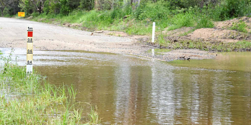 Water over a culvert in Kurrajong Rd yesterday after it reached 0.6 metres on Saturday.
