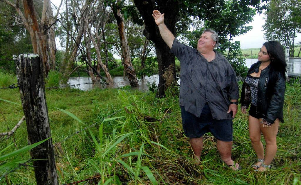 Brett Leach points out the height where Tahlia-Jade Bovero’s car was when she was washed off the road on Sunday night. Brett Leach points out the height where Tahlia-Jade Bovero’s car was when she was washed off the road on Sunday night.