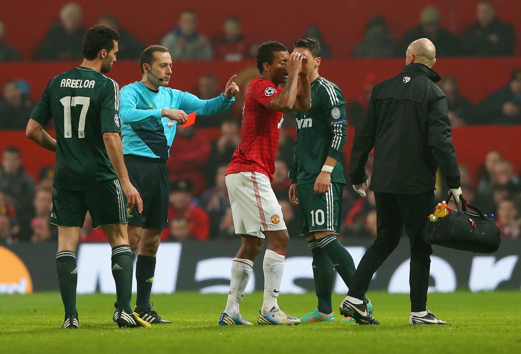 Referee Bahattin Duran sends off Nani of Manchester United during the UEFA Champions League Round of 16 Second leg match between Manchester United and Real Madrid at Old Trafford on March 5, 2013 in Manchester, United Kingdom. Referee Bahattin Duran sends off Nani of Manchester United during the UEFA Champions League Round of 16 Second leg match between Manchester United and Real Madrid at Old Trafford on March 5, 2013 in Manchester, United Kingdom.