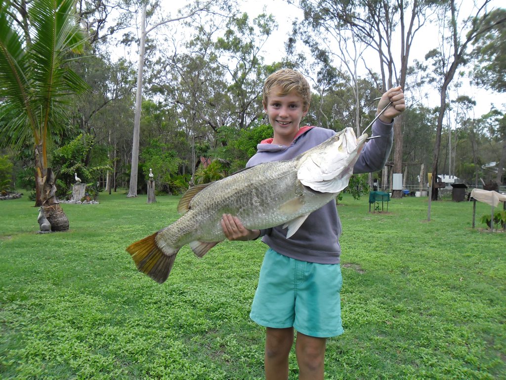Lachlan Joynson with his 9.4kg Barra caught in the Boyne Last weekend. Photo Contributed Lachlan Joynson with his 9.4kg Barra caught in the Boyne Last weekend. Photo Contributed