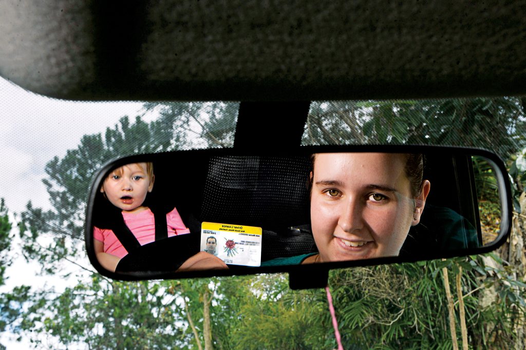 Jade Grissell of Richmond Hill, with daughter Marlee, 2, in backseat, has benefitted from a reduction in her licence cost because of her good driving record. Photo Cathy Adams / The Northern Star Jade Grissell of Richmond Hill, with daughter Marlee, 2, in backseat, has benefitted from a reduction in her licence cost because of her good driving record. Photo Cathy Adams / The Northern Star