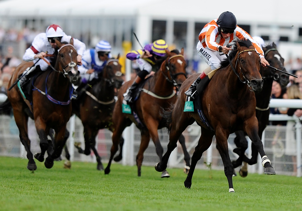 William Buick riding Ortensia (R) win The Gordon's King George Stakes at Goodwood racecourse on August 03, 2012 in Chichester, England. William Buick riding Ortensia (R) win The Gordon's King George Stakes at Goodwood racecourse on August 03, 2012 in Chichester, England.